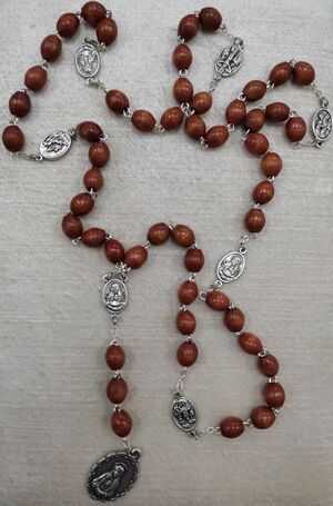 ROSARIO SIETE DOLORES OVAL MM6 1554-11