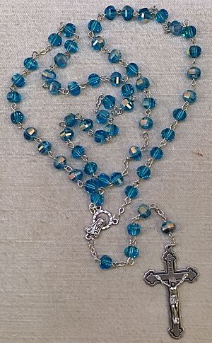 ROSARIO CRISTAL MULTICARAS CON CAJA AZUL AQUA