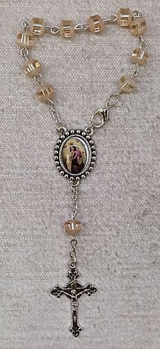 DECENA CRISTAL BISEL 6MM VIRGEN DEL CARMEN MIEL
