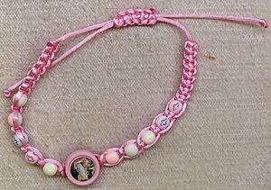 BRAZALETE NIÑOS CUERDA ROSA BOLA ÁNGEL DE LA GUARDA