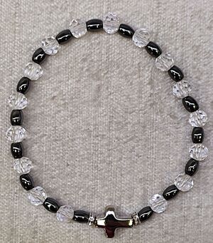 BRAZALETE TRANSPARENTE CRISTAL HEMATITES 6X4MM.
