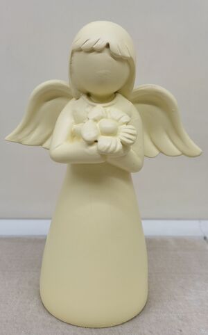 ÁNGEL CON FLOR EN RESINA AMARILLA 13 CM