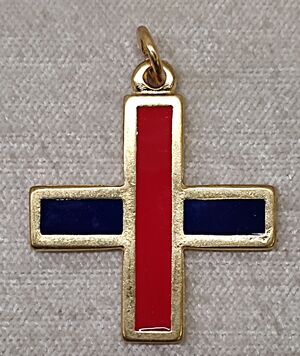 CRUZ TRINITARIA DORADA CON ESMALTE DOS COLORES  8X3 CM 04020178